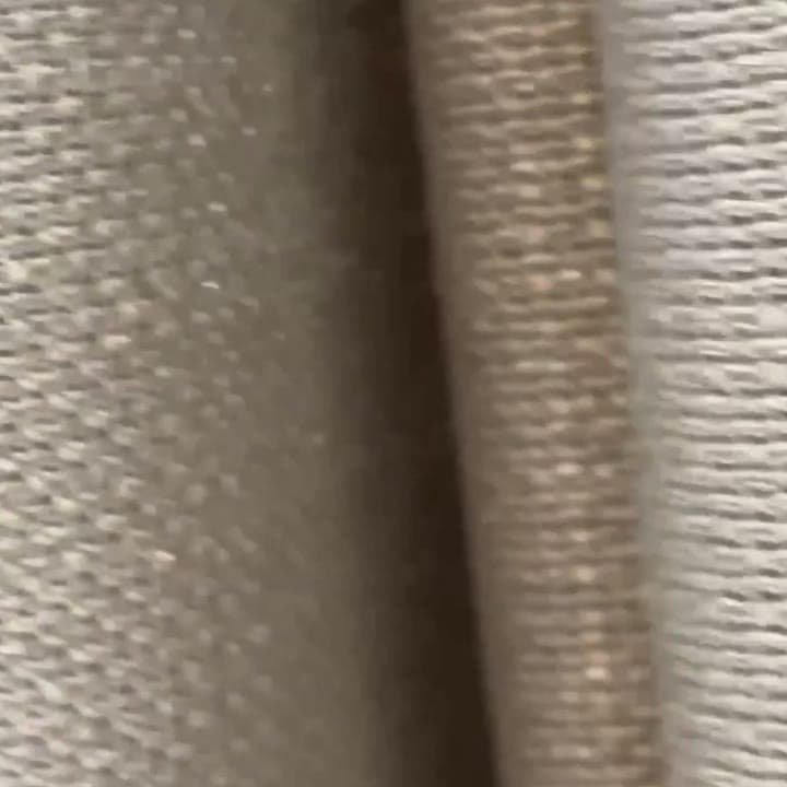 Close-up van een grof geweven gordijnstof